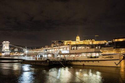 10PM Budapest Danube Cruise with Live Music & Food or Drinks - Candlelight welcome, sparkling wine, and live Hungarian folk music
