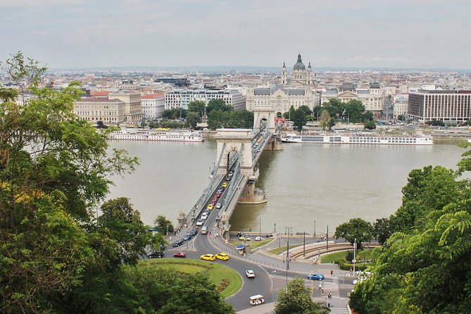 Buda Castle District Walk with Entry to Matthias Church - Royal Palace courtyards and the reminder that this district is still active
