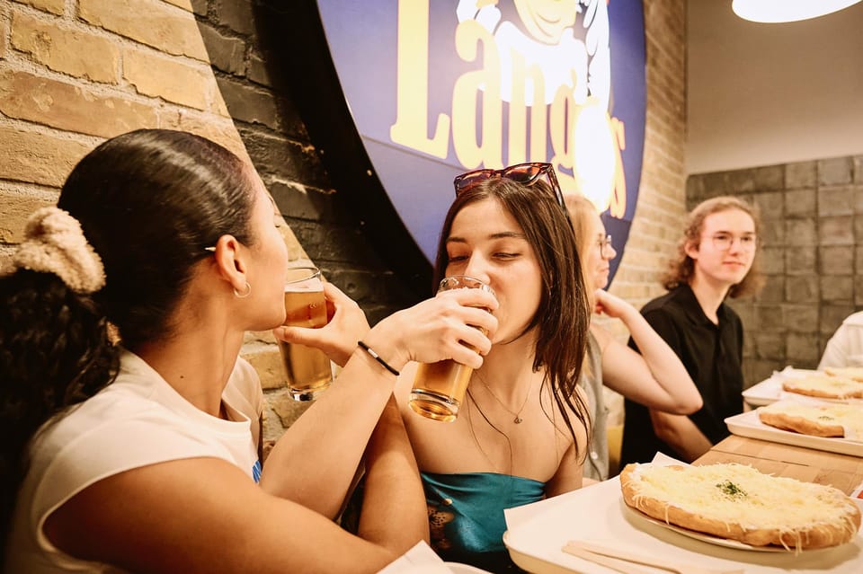 Budapest: Guided Food Tour with Wine, Beer, and Shots - Sweet Tokaji wine, beer, and shots: how the drinks are used