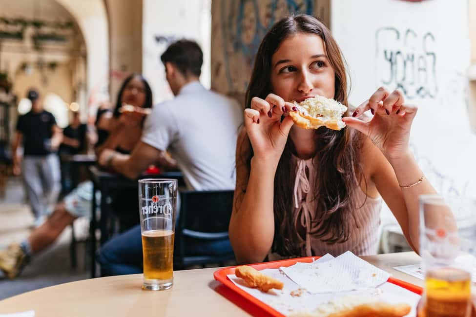 Budapest: Guided Foodie Walking Tour with Food and Drinks - Jewish Quarter walking, plus a stop along Andrassy Avenue