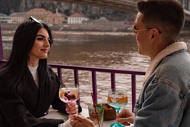 Cocktail Cruise and City Views on the Danube in Budapest - The Danube at night: Buda Castle and the Castle District glow