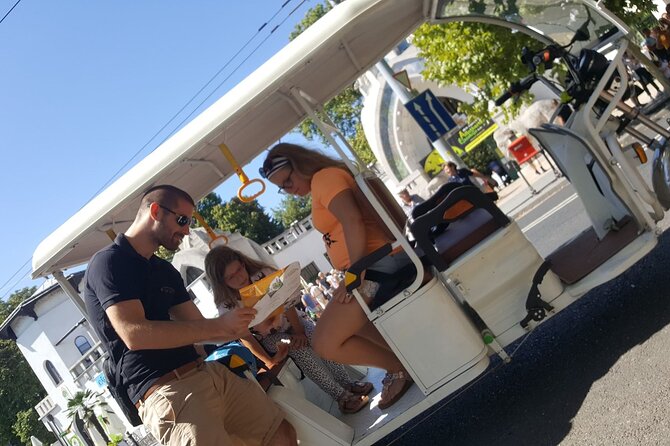 Private Sightseeing Tour using Electric Tuk Tuk Ride in Budapest - Thermal bath views: Gellért and Rudas from the route